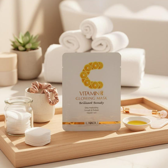 Vitamin C glowing mask packaging on a wooden tray with a blurred background