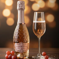 Bottle and glass of Pizzolato Prosecco with grapes on a wooden surface and blurred lights background