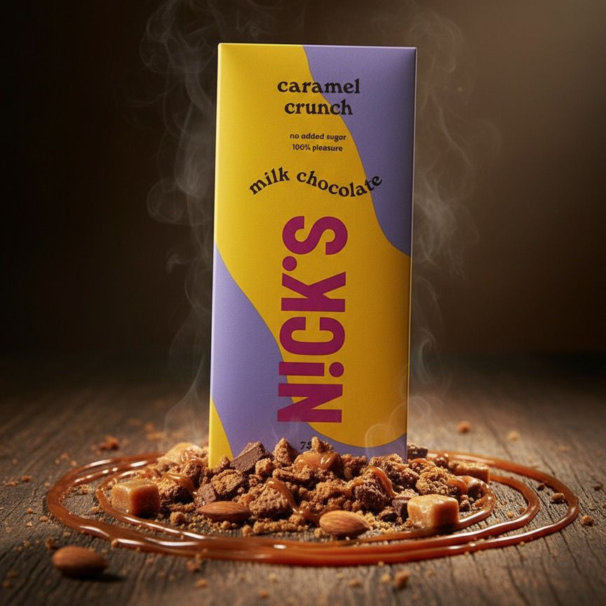 NICK'S caramel crunch milk chocolate packaging with chocolate pieces and caramel on a dark background